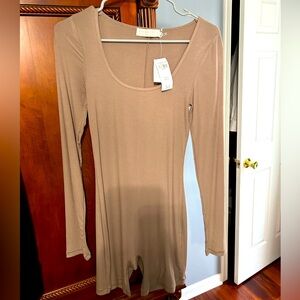 NWT tan and fitted yoga short bodysuit.romper